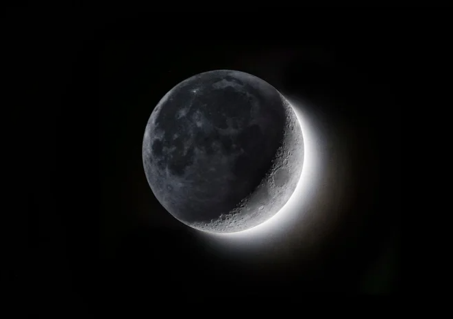 The dark side of the moon, representing the 98% of tumor antigens invisible to current vaccine programs